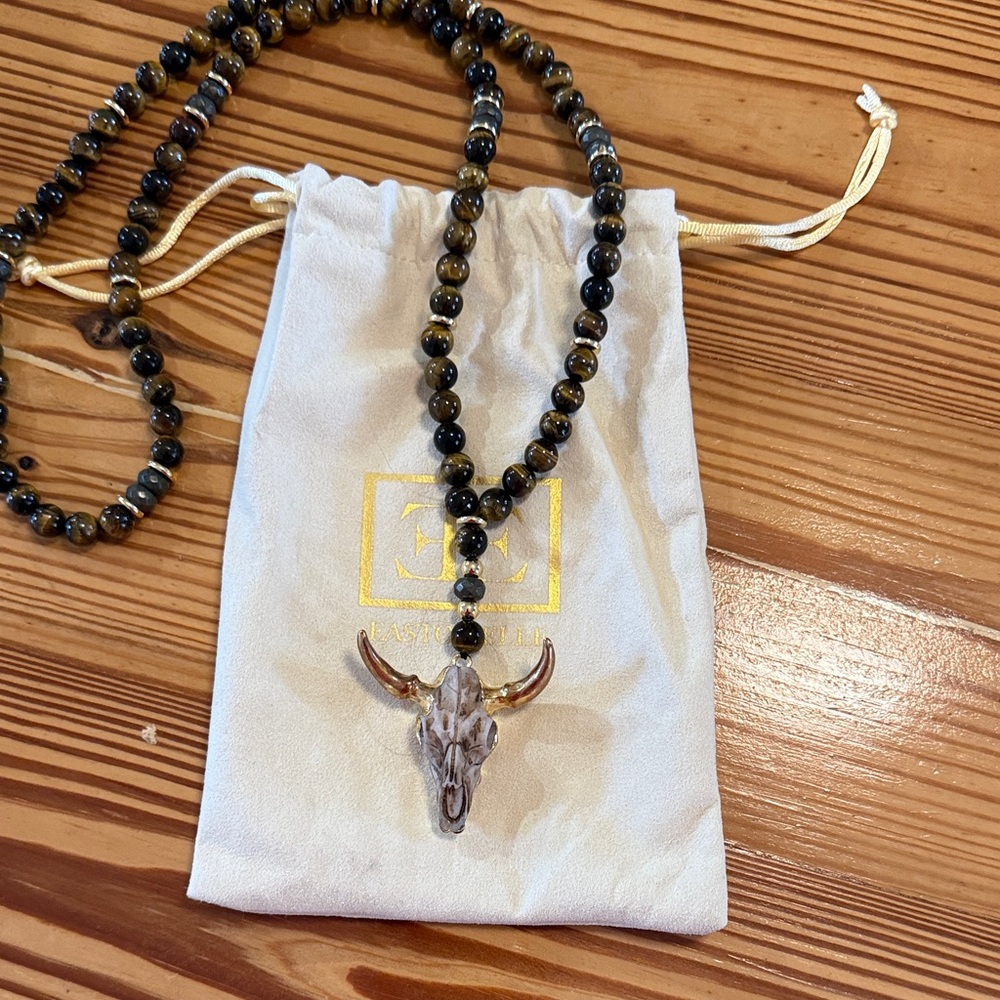 Easton Elle brown bead necklace bull head trimmed in gold. Dust bag. 18in